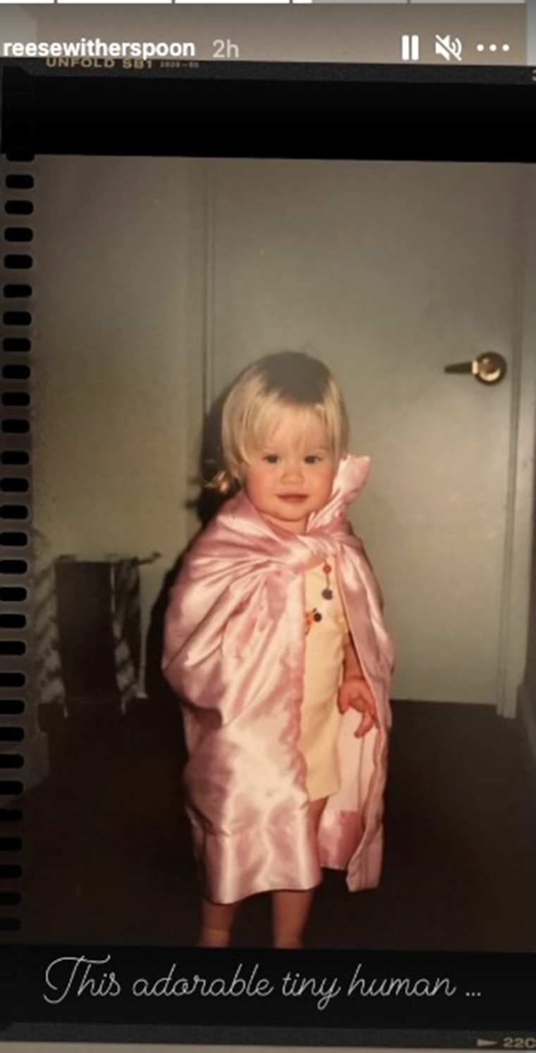In another throwback, Ava is seen wearing a shimmery pink blanket as a cape.