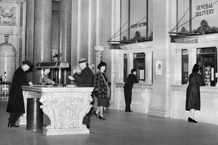 Image: Customers at the Main Post Office in Washington in 1938.