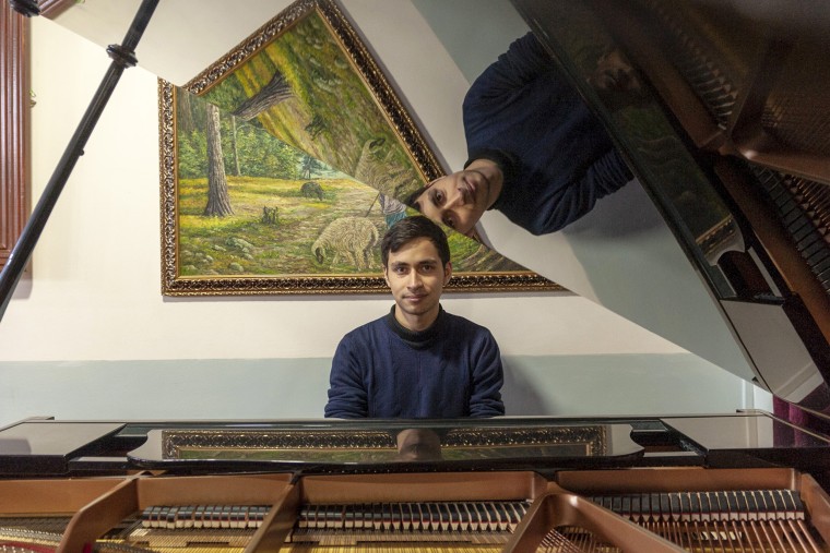 Pianist Arson Fahim, 21, left Kabul for the U.S. just 2 weeks before the Taliban took over the Afghan capital to study music in the U.S. 