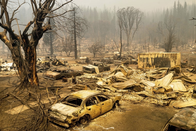 Image: Cars and homes destroyed by the Dixie Fire line central Greenville on Thursday, Aug. 5, 2021, in Plumas County, Calif.