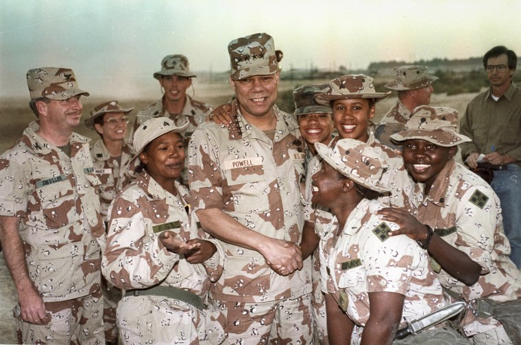 Chairman of the Joint Chiefs of Staff General Colin Powell and members of the 132nd MP Company in Saudi Arabia on Dec. 22, 1990.