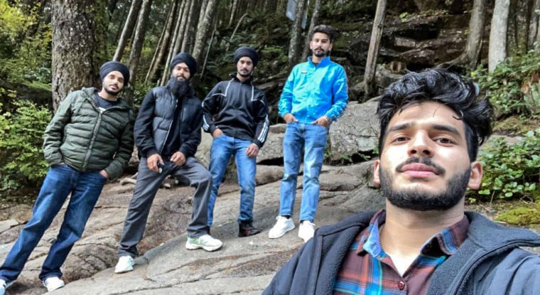 Kuljinder Kinda, left, and his friends at Golden Ears Provincial Park in British Columbia on Oct. 11, 2021.