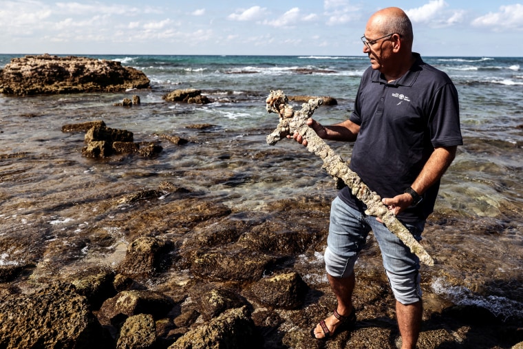 A sword believed to have belonged to a Crusader who sailed to the Holy Land almost a millennium ago was found in Caesarea