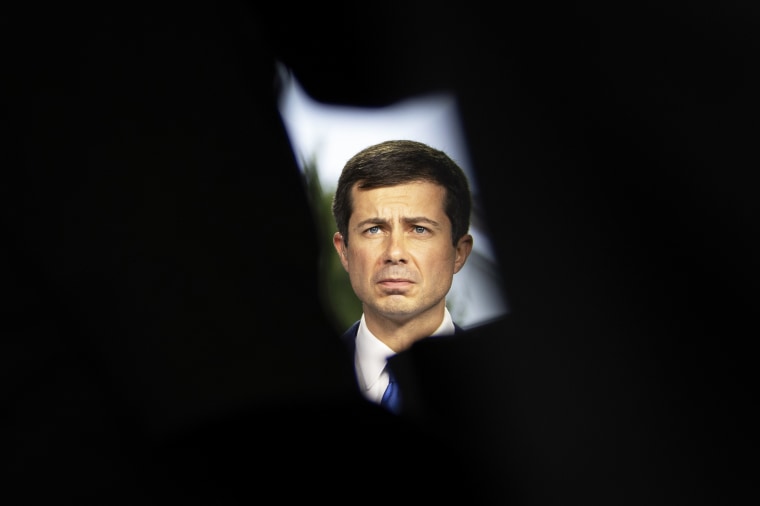 Transportation Secretary Pete Buttigieg does a television interview with CNBC outside the White House on Oct. 13, 2021.