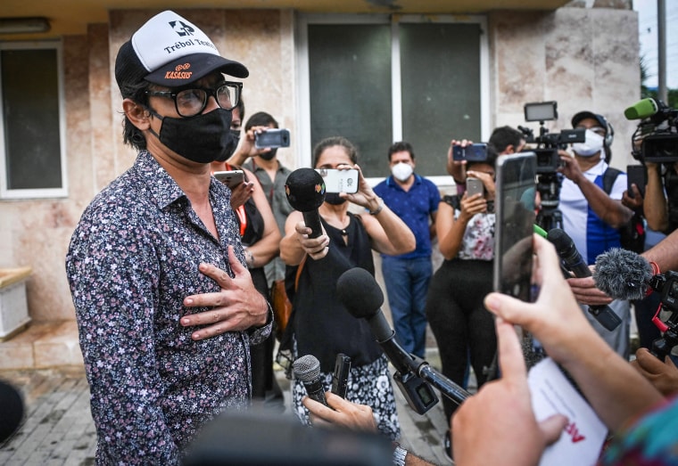 Image: Cuban actor, playwright and opposition activist Yunior Garcia Aguilera talks to the press on his way out of the Havana Provincial Prosecutor's Office, on Oct. 21, 2021.