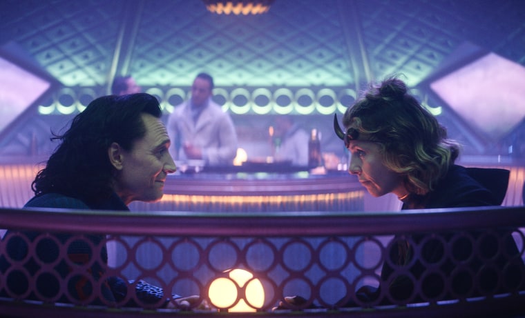Tom Hiddleston as Loki and Sophia Di Martino as Sylvie in Marvel Studios' "Loki."