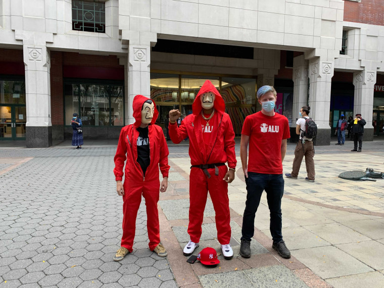 Amazon workers wear costumes Monday as they file a petition with the National Labor Relations Board’s regional office in Brooklyn, N.Y. 