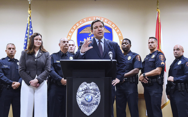 Florida Gov. Ron DeSantis announces a proposal to provide signing bonuses to those who sign on to be law enforcement officers at the Lakeland Police Department on Sept. 7.