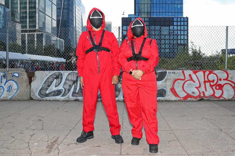 Cosplayers attend New York Comic Con as Squid Game characters on Oct. 8, 2021.