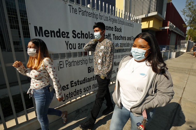 Students complete their Covid testing on Aug. 13, 2021, at Mendez High School in preparation for returning to campus for the first day of in-class instruction in the Los Angeles Unified School District since the pandemic began. 