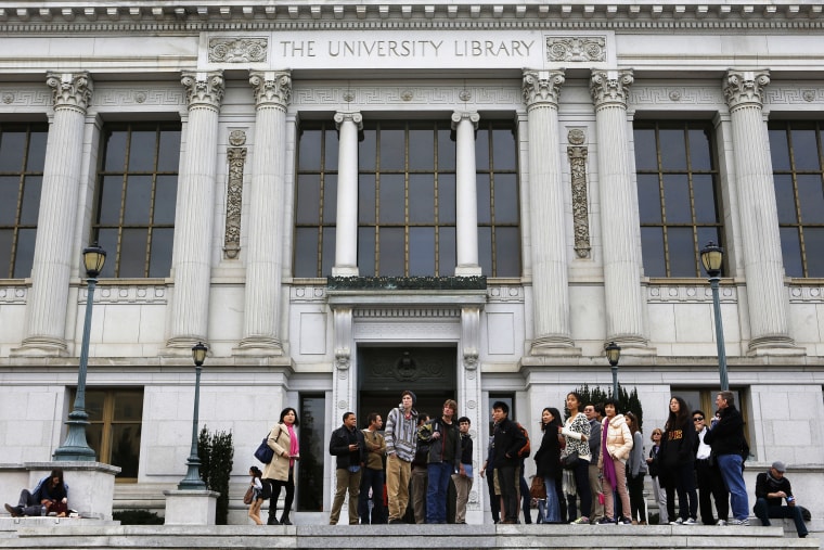 A tour group stops outside Doe Library on the UC Berkley campus in Berkley, Calif., on Jan. 28, 2014.