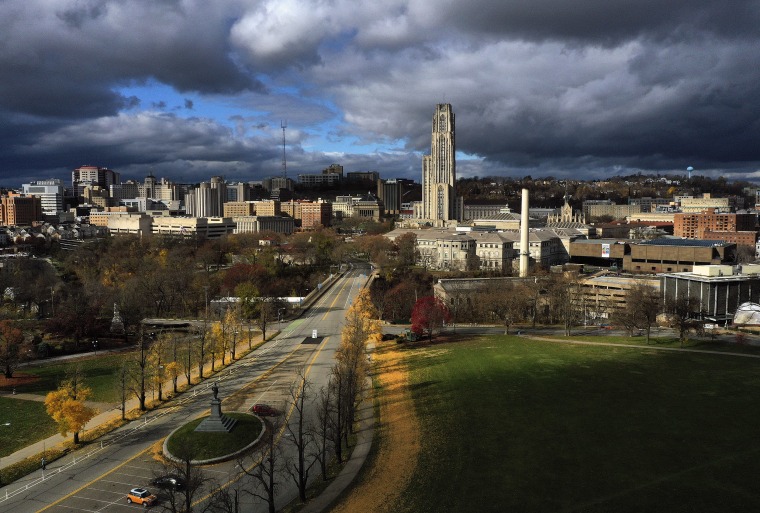 The Cathedral of Learning, center, towers over the University of Pittsburgh campus on Nov. 26, 2020.