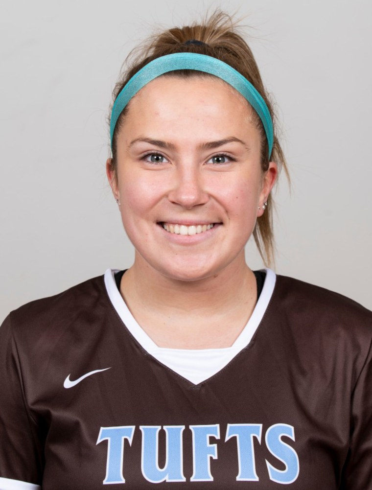 Madie Nicpon poses for a Tufts Women's Lacrosse Team photo on Feb. 14, 2020. (Alonso Nichols/Tufts University)