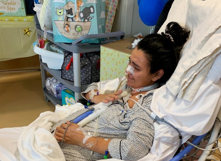 María Roque Díaz is surprised by doctors and nurses at the University of Maryland Medical Center with a baby shower celebration for her and her newborn Dylan.