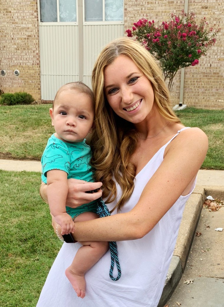 Meghan Borkowicz, a nurse from the University of Maryland Children’s Hospital who cared for Dylan, holds him during a visit to the family’s home.