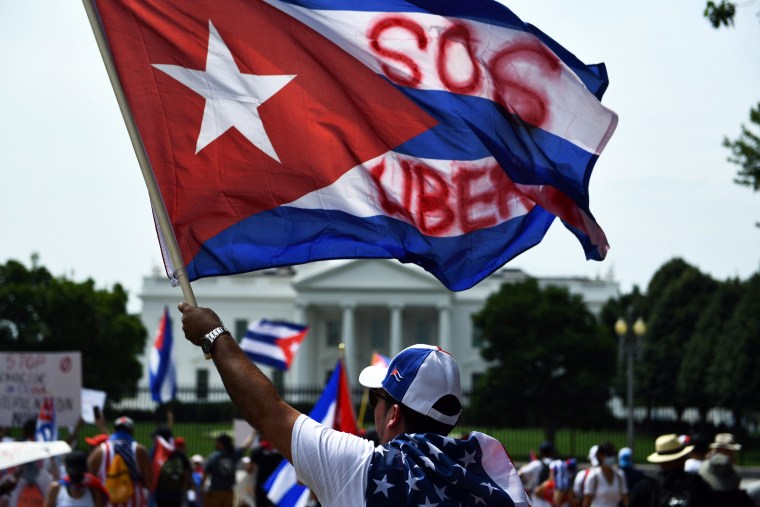 People gather for a protest in solidarity with Cuban people near the White House in Washington on July 26, 2021.