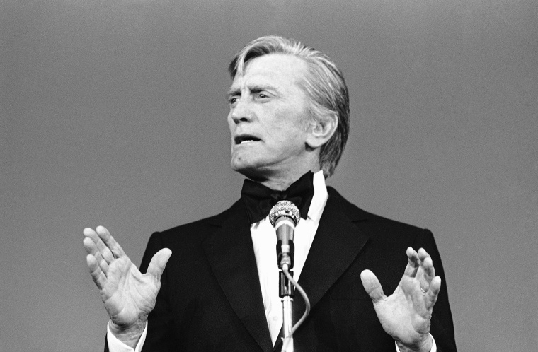 Kirk Douglas speaks at the Cannes Film Festival on May 23, 1980, in France.
