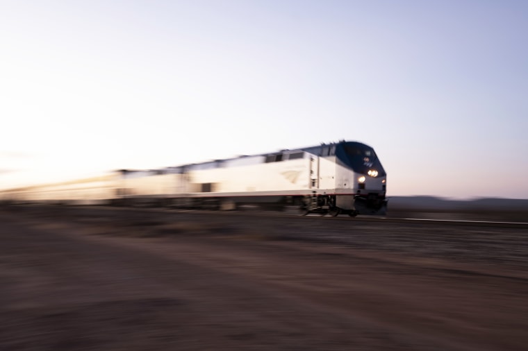 An Amtrak passenger train speeds by near Valentine, Texas, on April 10, 2021.