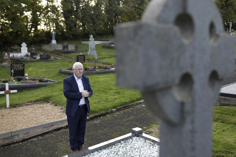 Eugene Reavey visits the graves of his three brothers in Whitecross, Northern Ireland. 