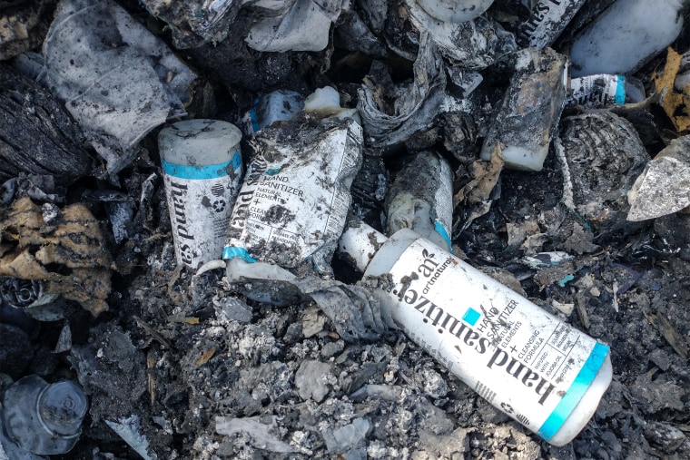 A charred bottle of Artnaturals hand sanitizer by the company's warehouse.