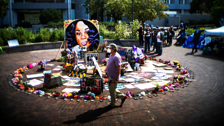 Protesters gather near the memorial for Breonna Taylor in Louisville, Ky., on Sept. 25, 2020.