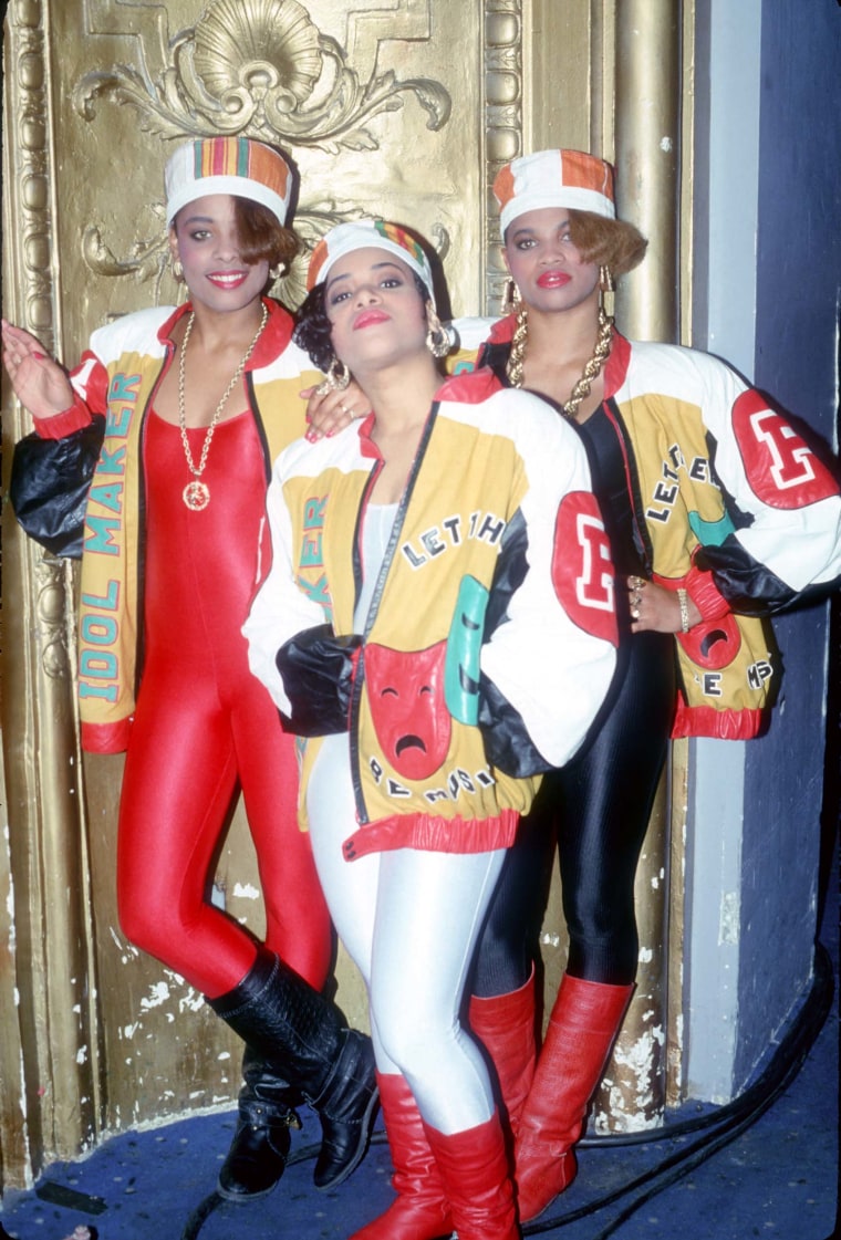 Salt-N-Pepa photographed in 1988 wearing their outfits from the "Push It" music video, designed by Dapper Dan.