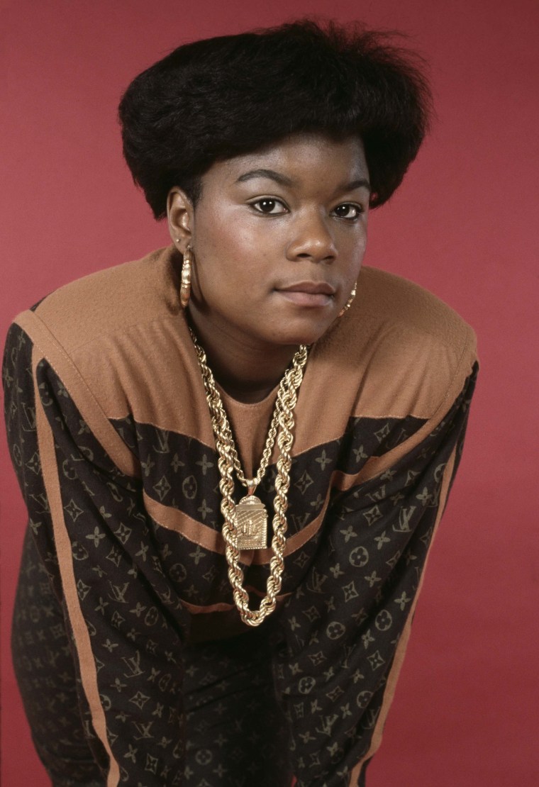 American hip hop musician and rapper Roxanne Shante, wearing an outfit by Dapper Dan, circa 1989.