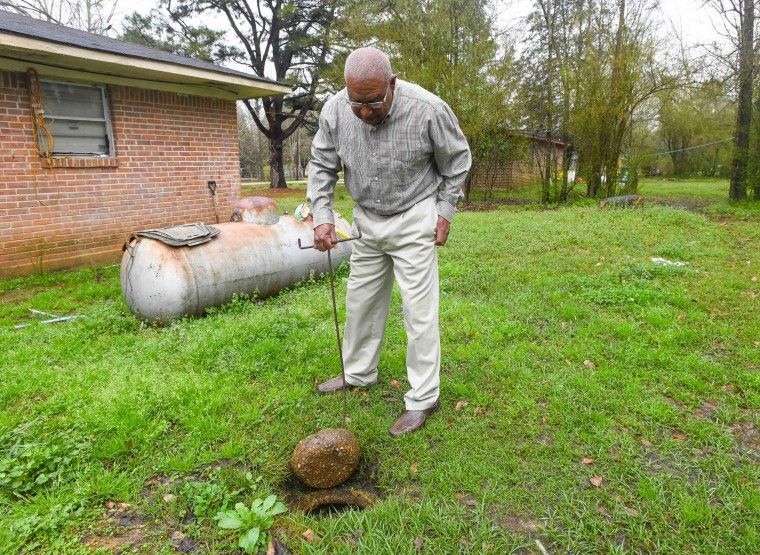 Lowndes County resident Jerome Means talks about his failing wastewater sanitation system at his home in Hayneville, Ala.