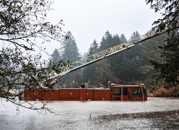 A firetruck in floodwaters in Otis, Ore. on Nov. 12, 2021.