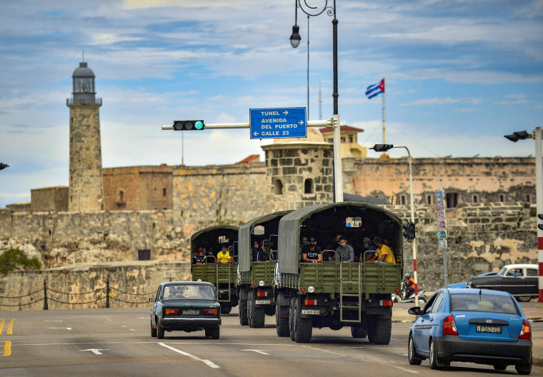 Image: Police vehicles drive along El Paseo del Prado street in Havana, on Nov. 15, 2021.