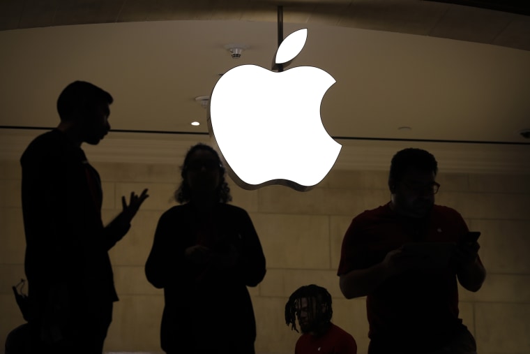 Image: Employees in an Apple retail store in Grand Central Terminal  in New York City on Jan. 3, 2019.