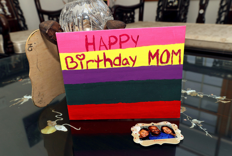 A wooden birthday card Christian made for his mother decorates a table top in the Halls home.