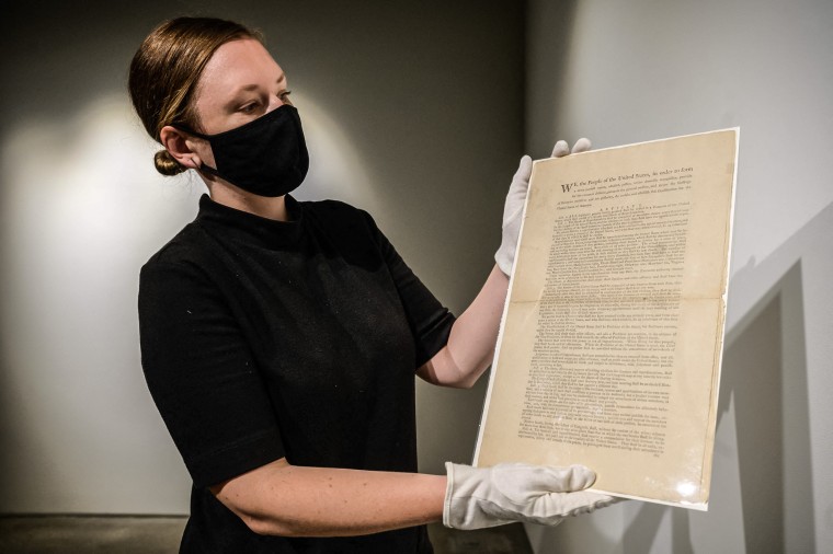 Image: A page of the first printing of the United States Constitution is displayed at the offices of Sotheby's auction house in New York on Sept. 17, 2021.