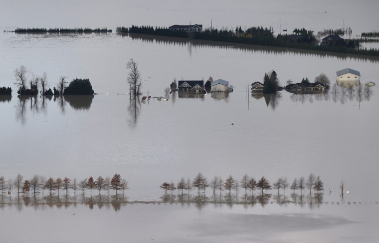 Floodwaters surround homes and farms on November 20, 2021 in Abbotsford, British Columbia.