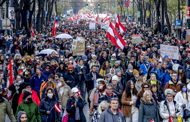 Image: Hundreds of people take part in a demonstration against the country's coronavirus restrictions in Vienna on Nov. 20, 2021.