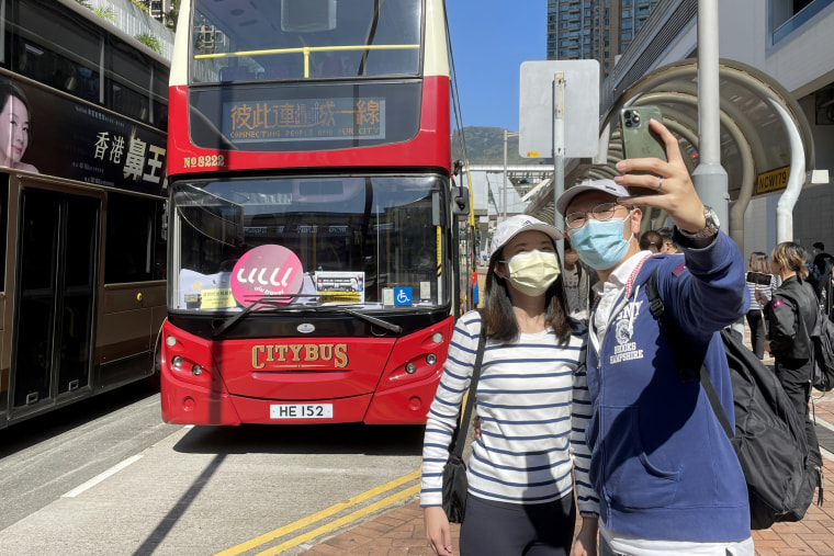 Charles and Jenny Chung before boarding the “Bus Sleeping Tour.” 