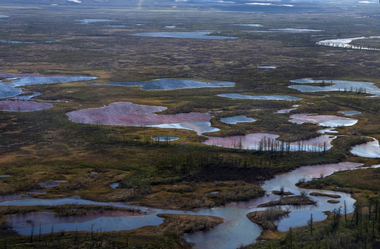 An aerial view shows the pollution in a river outside Norilsk on June 6, 2020, after a subsidiary of metals giant Norilsk Nickel's massive diesel spill on May 29.