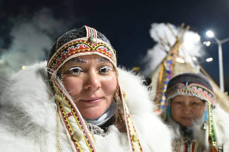 Valeriya "Lera" Bolgova, a leader of the Nganasan people, one of five Indigenous tribes of the Taimyr peninsula, at a local festival in October 2021. The region's first people have been unique witnesses to Norilsk Nickel's indelible imprint on the environment, because fish and reindeer meat are still central to their diets.