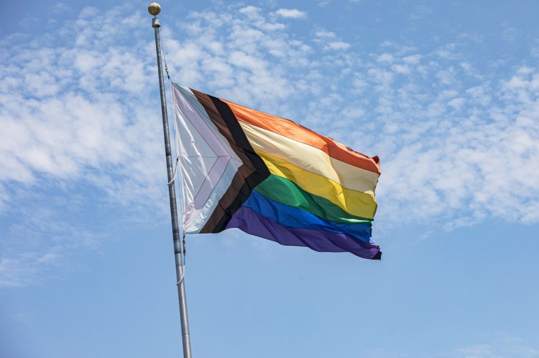 A pride flag flutters in the wind on July 10, 2021, in San Diego, Calif.