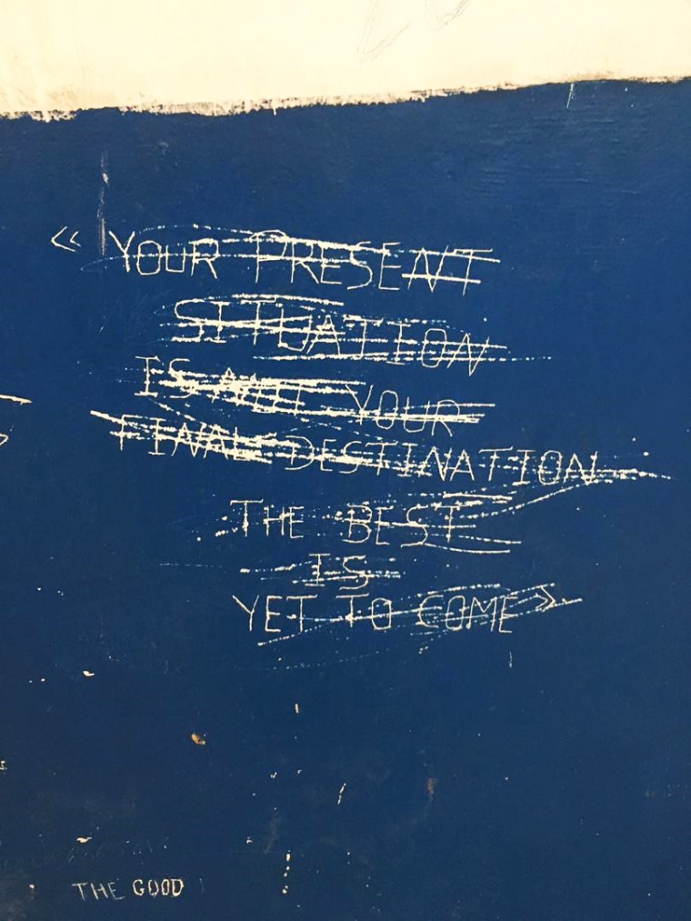 A message is scratched out on a wall inside the Gharyan Detention Center in Libya.