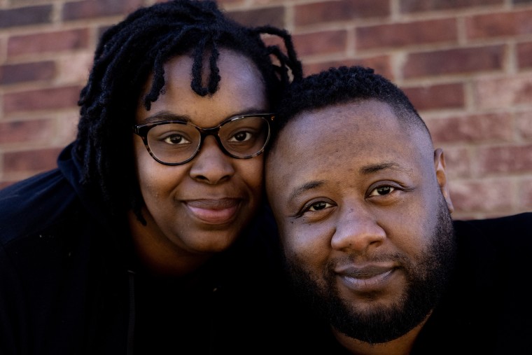 Image: Tahj Graham with his girlfriend Isha Williams at home in Mansfield, Texas, on Nov. 28, 2021.