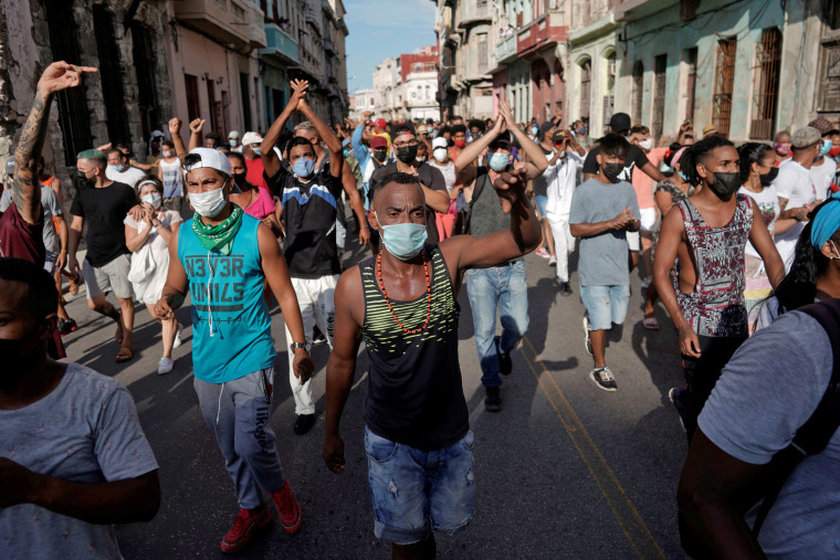 Protesters shout slogans against the government in Havana on July 11, 2021.