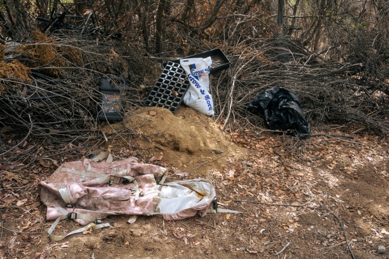 Image: Toxic fertilizer, grow pods and a backpack were left by cartel farmers at the grow site.