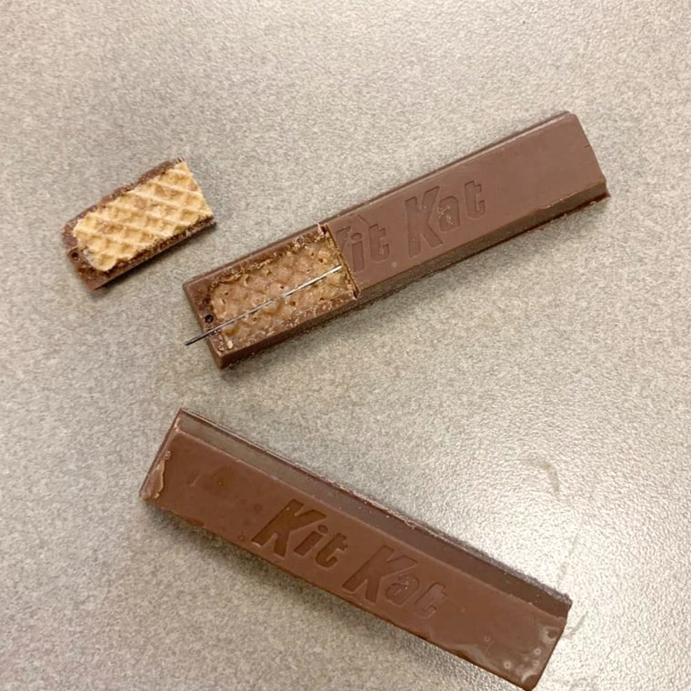 Police in Fostoria, Ohio, alerted parents on social media about a sewing needle  discovered inside a Kit Kat bar distributed at a trick-or-treating event Saturday.