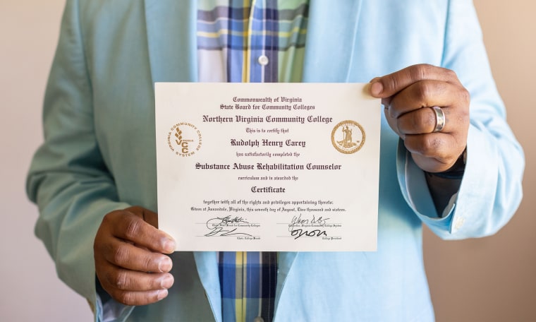 Image: Two hands holding a certificate issued by the Northern Virginia Community College. It reads,"This is to certify that Rudolph Henry Carey has satisfactorily completed the Substance Abuse Rehabilitation Counselor curriculum and is awarded the Certificate."