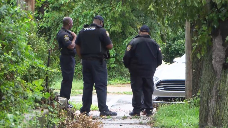 Image: Police respond to the scene of a shooting at a bus stop in Louisville, Ky., on Sept. 22, 2021.