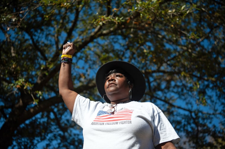 Abortion rights advocate Valencia Robinson cheers at a rally in Jackson, Miss., on Dec. 1, 2021.