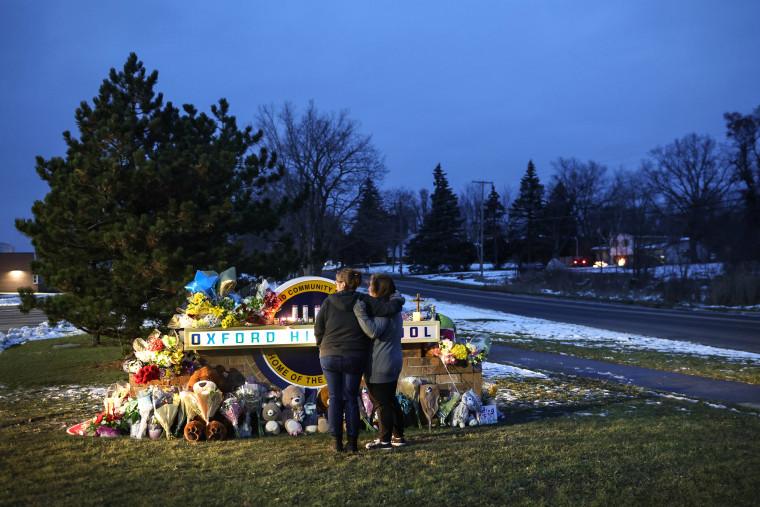 Image: People visit a makeshift memorial outside of Oxford High School on Dec. 1, 2021 in Oxford, Mich.