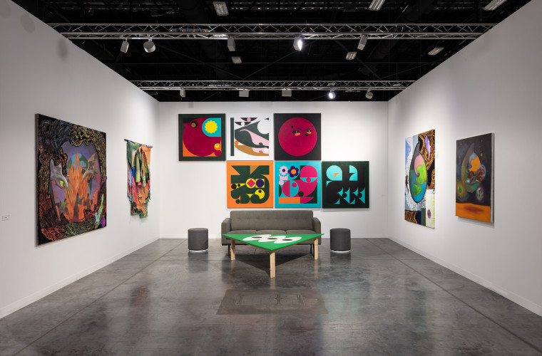 Ad Minoliti’s paintings (back wall) in an Art Basel group showing with the work of artist Zadie Xa at the Miami Beach Convention Center on Dec. 2, 2021.
