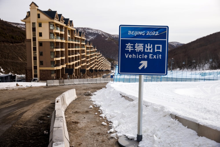 Image: A sign shows the exit from a skiing venues of Beijing 2022 Winter Olympics in Zhangjiakou
